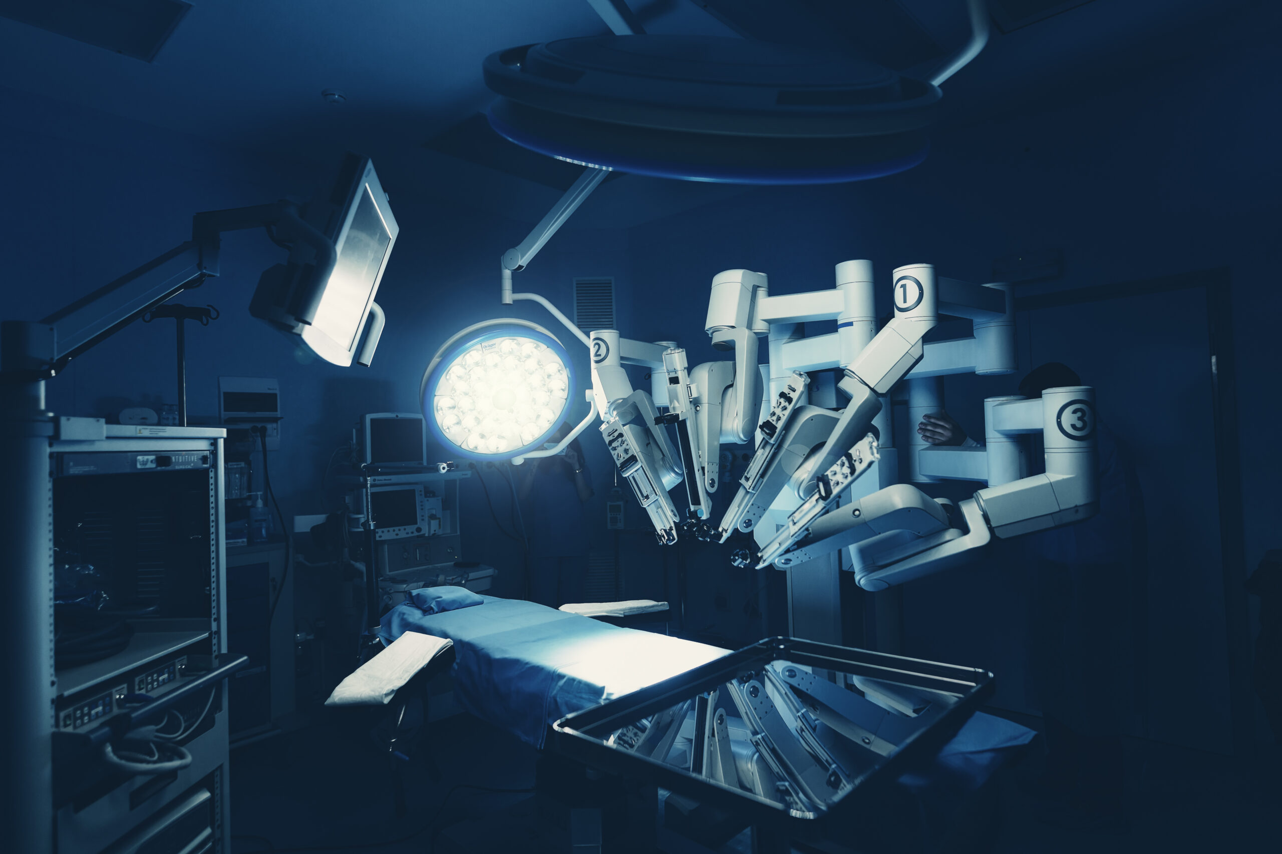 Surgical room in hospital with robotic technology equipment, machine arm surgeon in futuristic operation room. Minimal invasive surgical inoovation, medical robot surgery with 3D view endoscopy